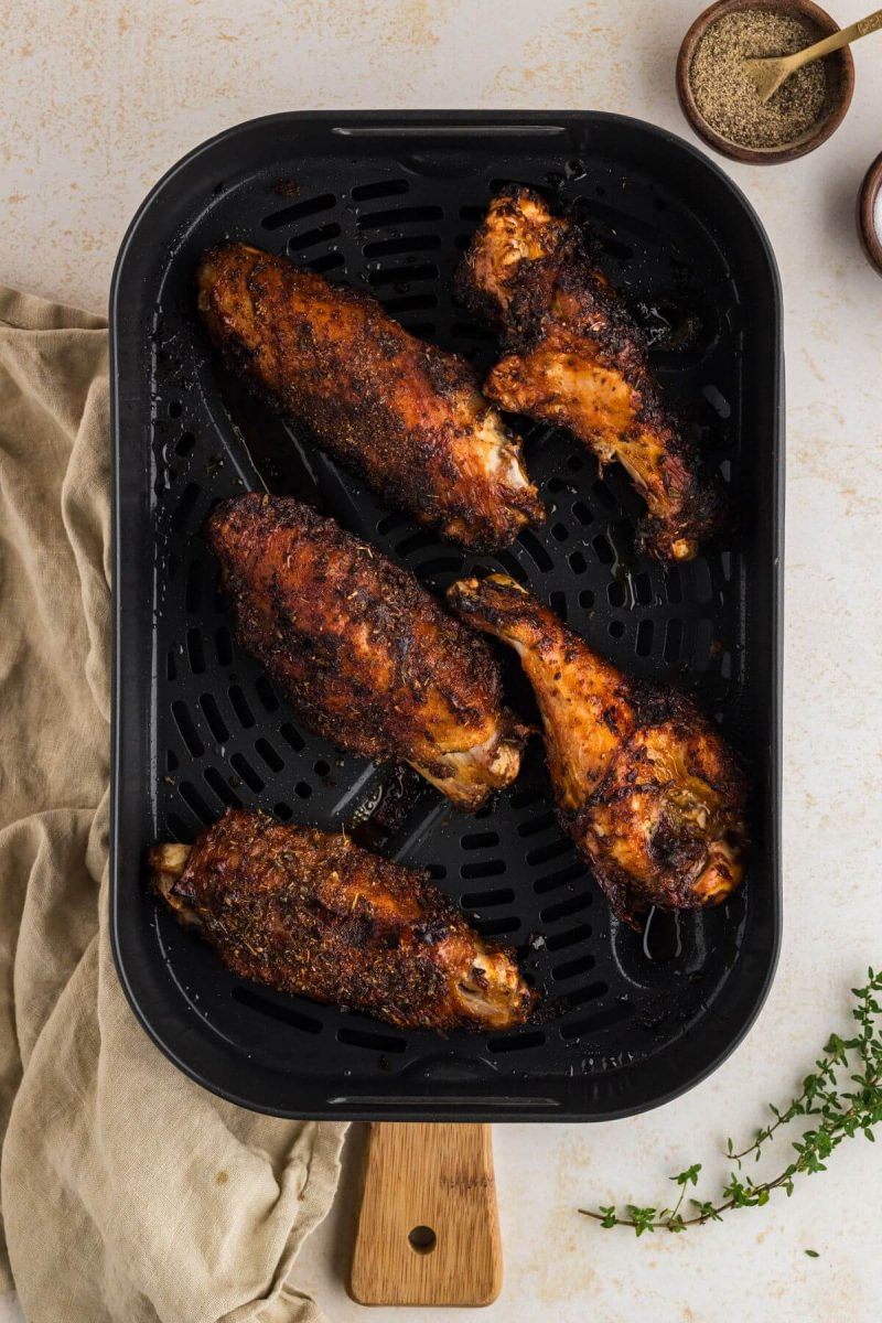 https://www.thefreshcooky.com/wp-content/uploads/2023/10/Easy-Crispy-Air-Fryer-Turkey-Wings-Recipe-remove-from-air-fryer-and-rest-800x1200.jpg