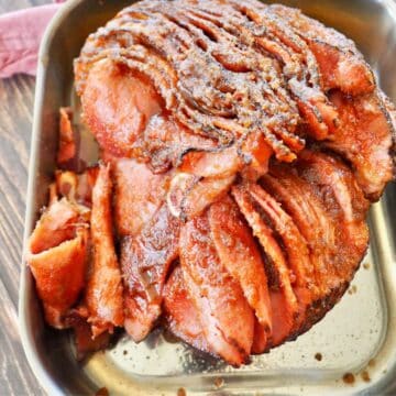 Spiral ham warmed in crockpot and glazed in the oven.