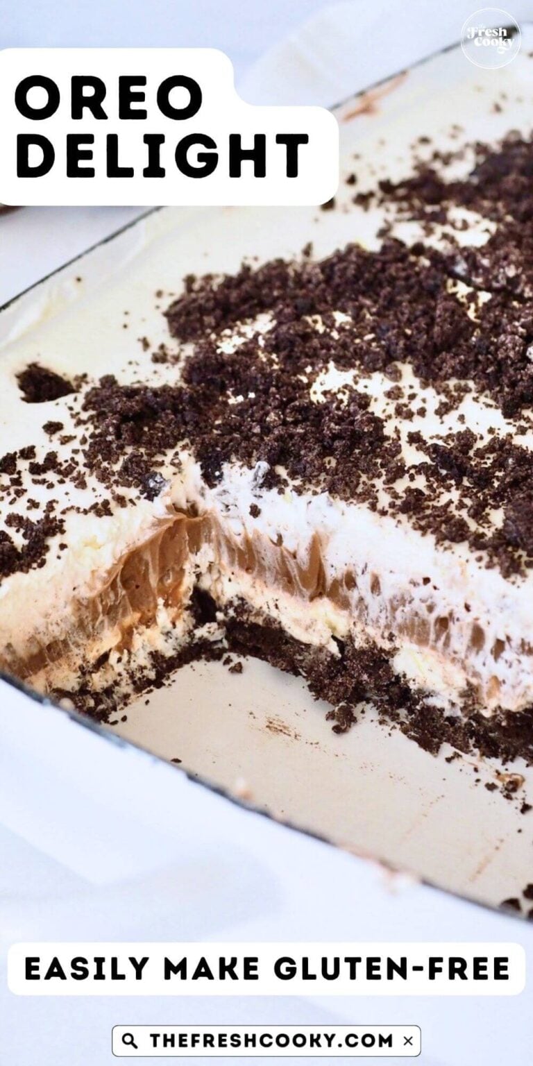 Close-up showing the pretty layers of Oreo Dessert Pudding with Oreo cookie crust, in pan, for pinning.