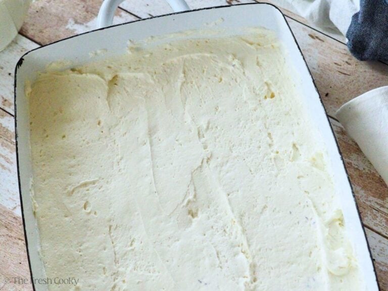 Smoothed cream cheese layer on Oreo cookie crust.