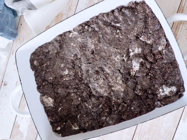 Pressed Oreo Cookie Crust in pan.