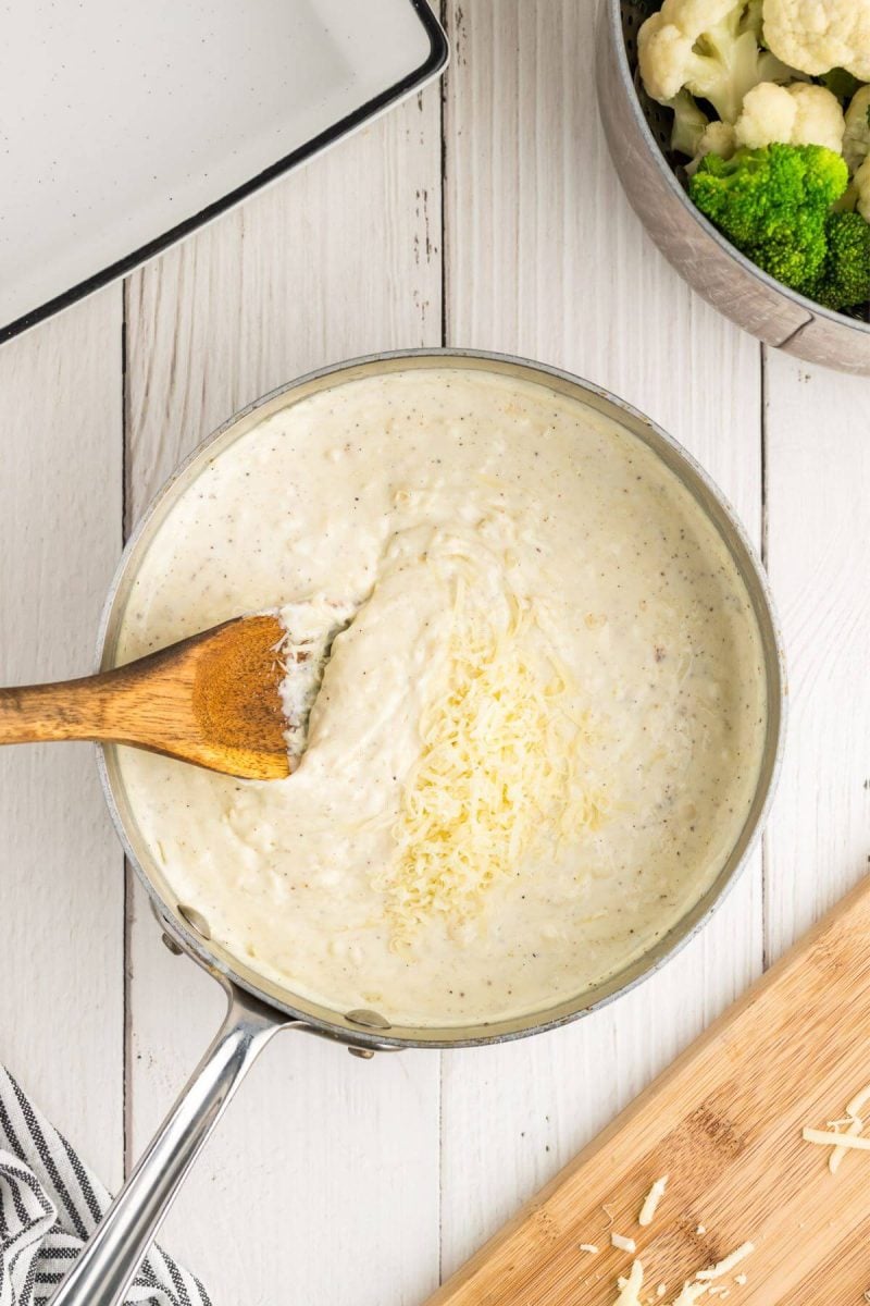 Add seasonings to the last batch of cheese, stirring to combine. 