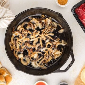 Caramelized onions in a cast iron skillet.