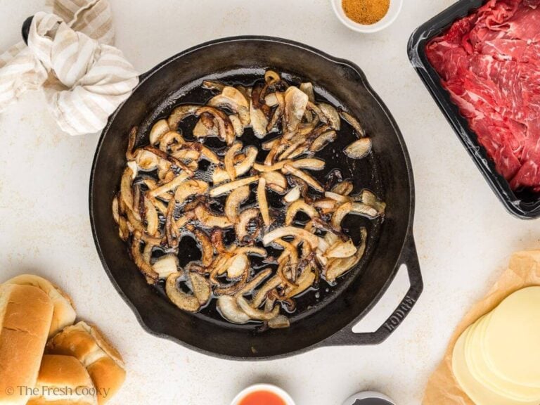 Caramelized onions in a cast iron skillet.