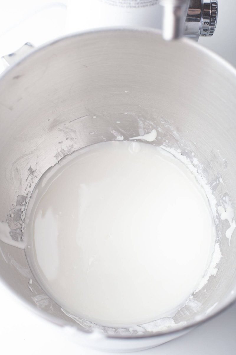 A mixing bowl holds icing mix.