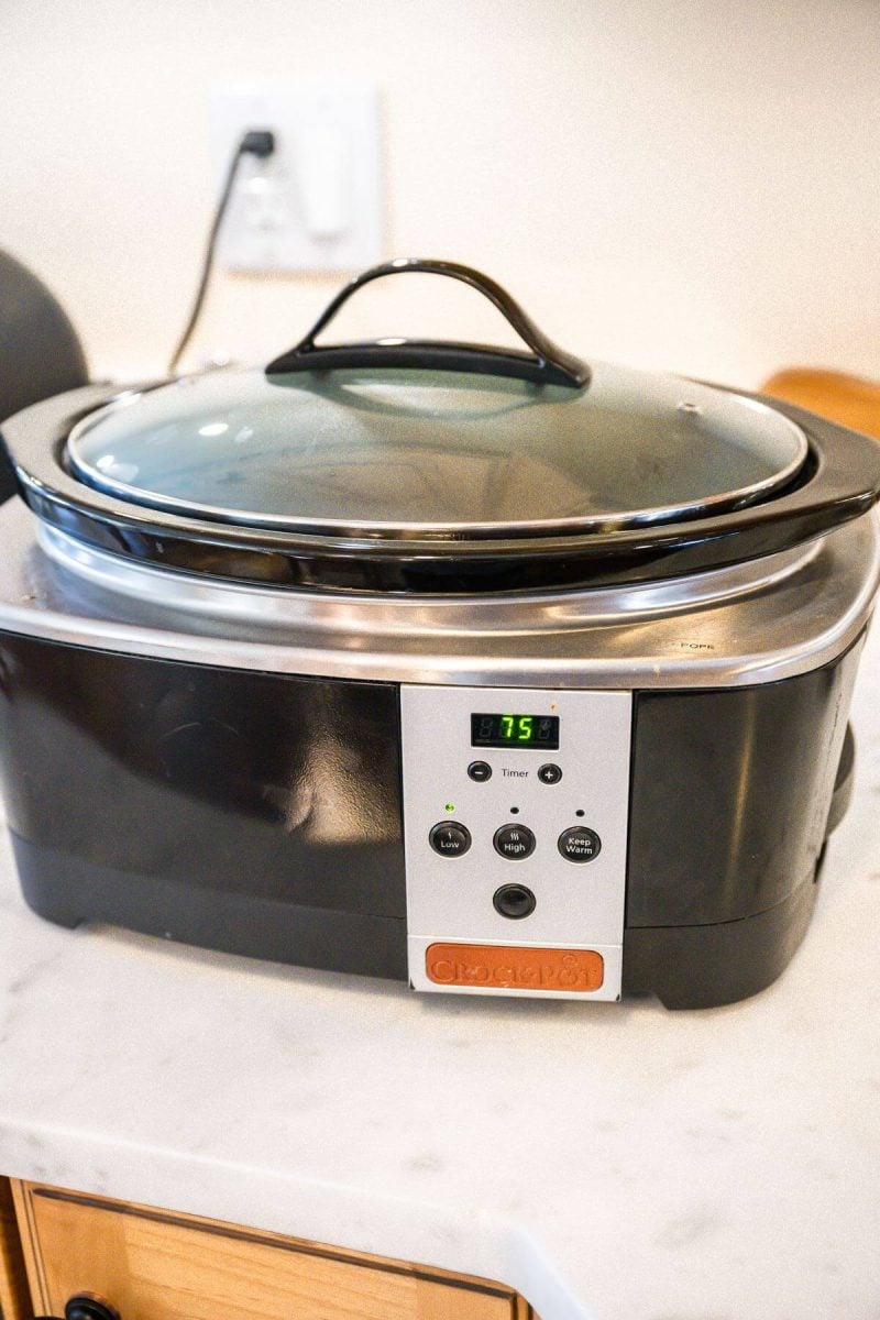 A crockpot sits on table.