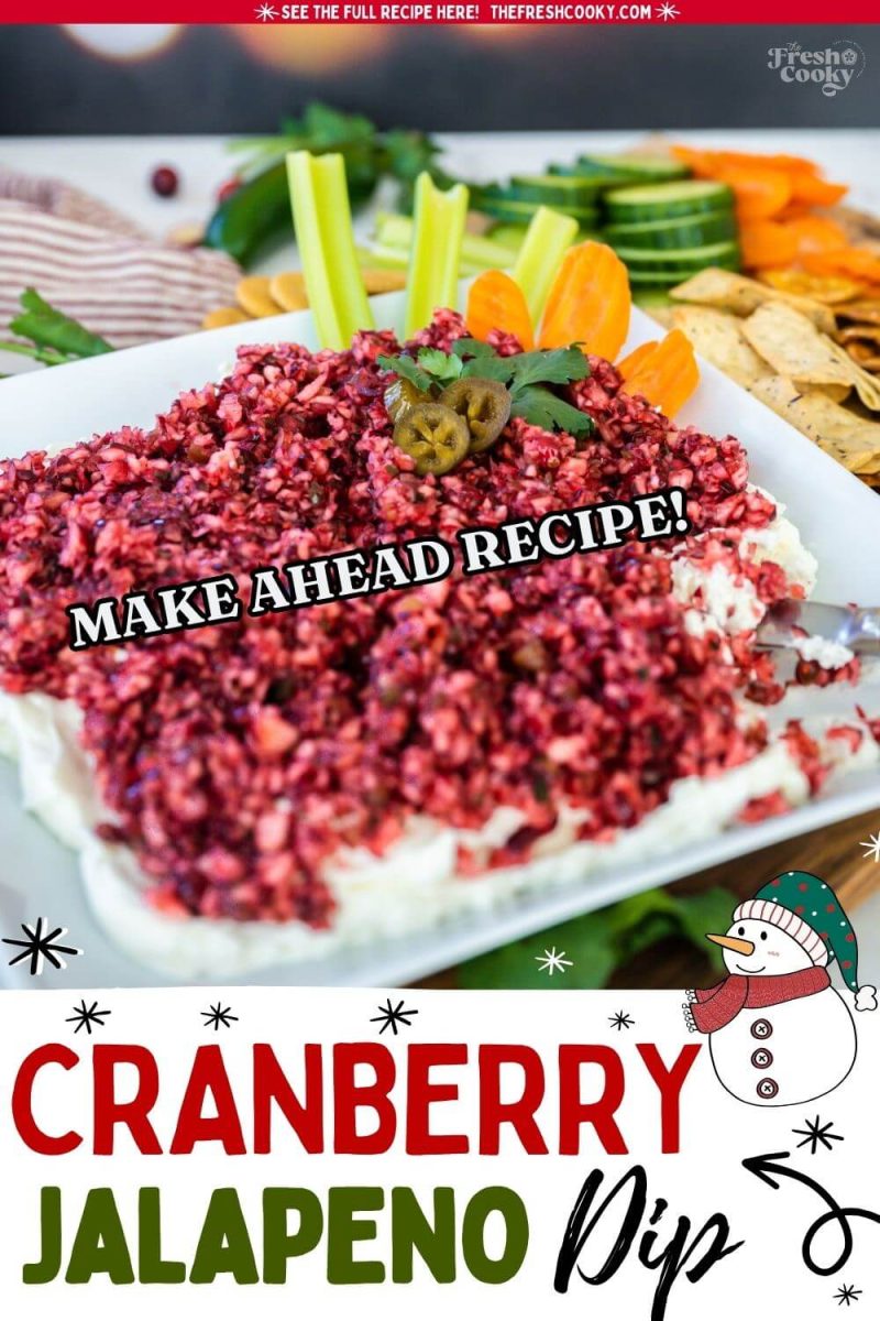 A square platter holds a lot of cranberry dip alongside veggies, to pin.