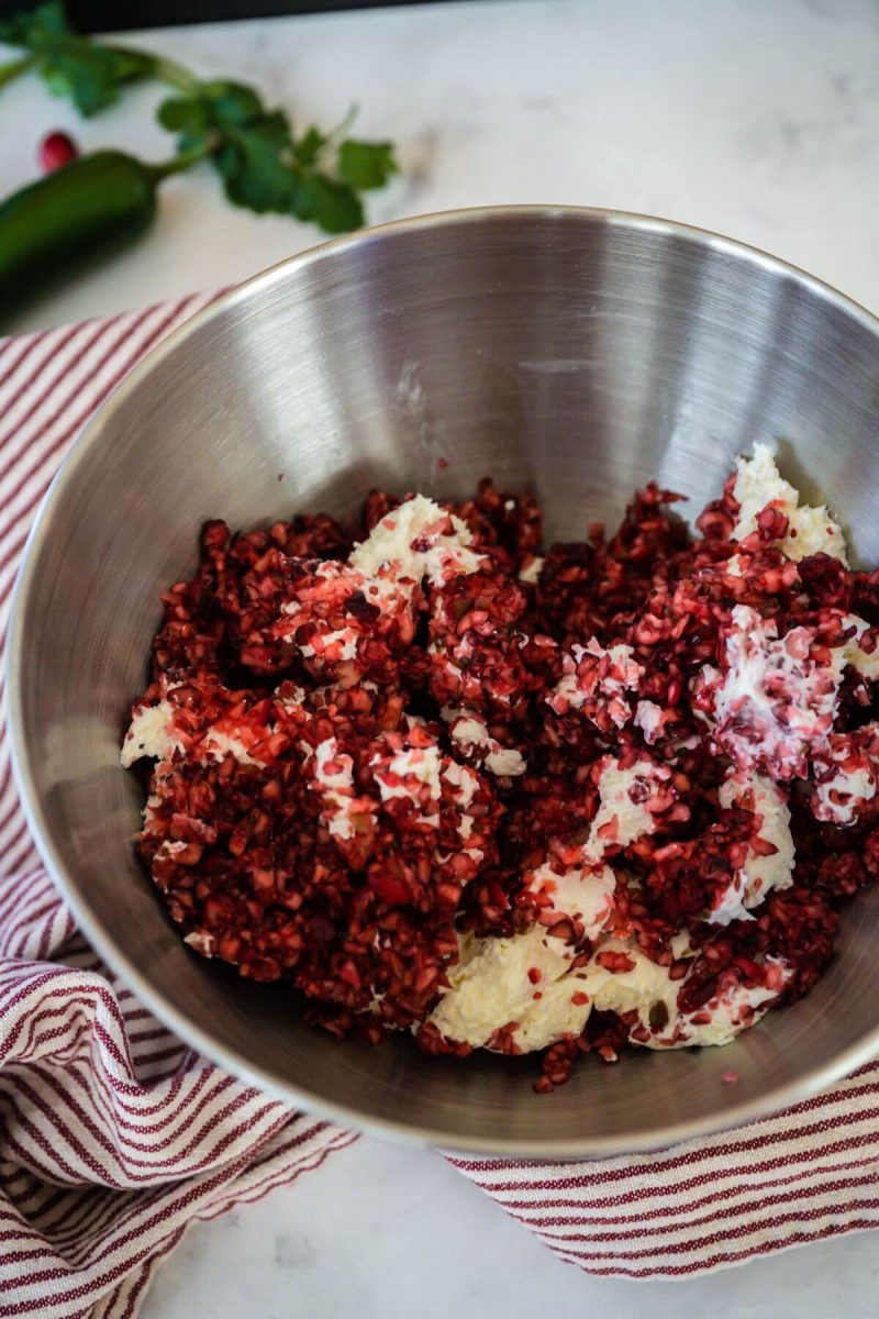 Add cream cheese and relish to a mixer bowl. 