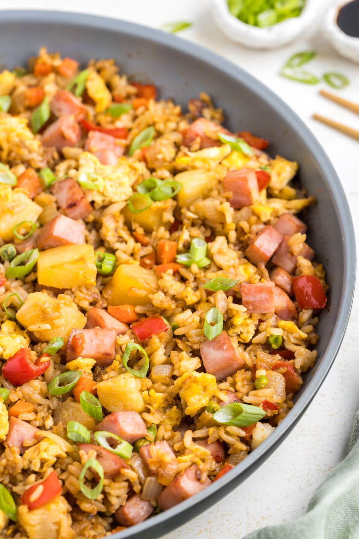 Half of a pan of fried rice is shown.