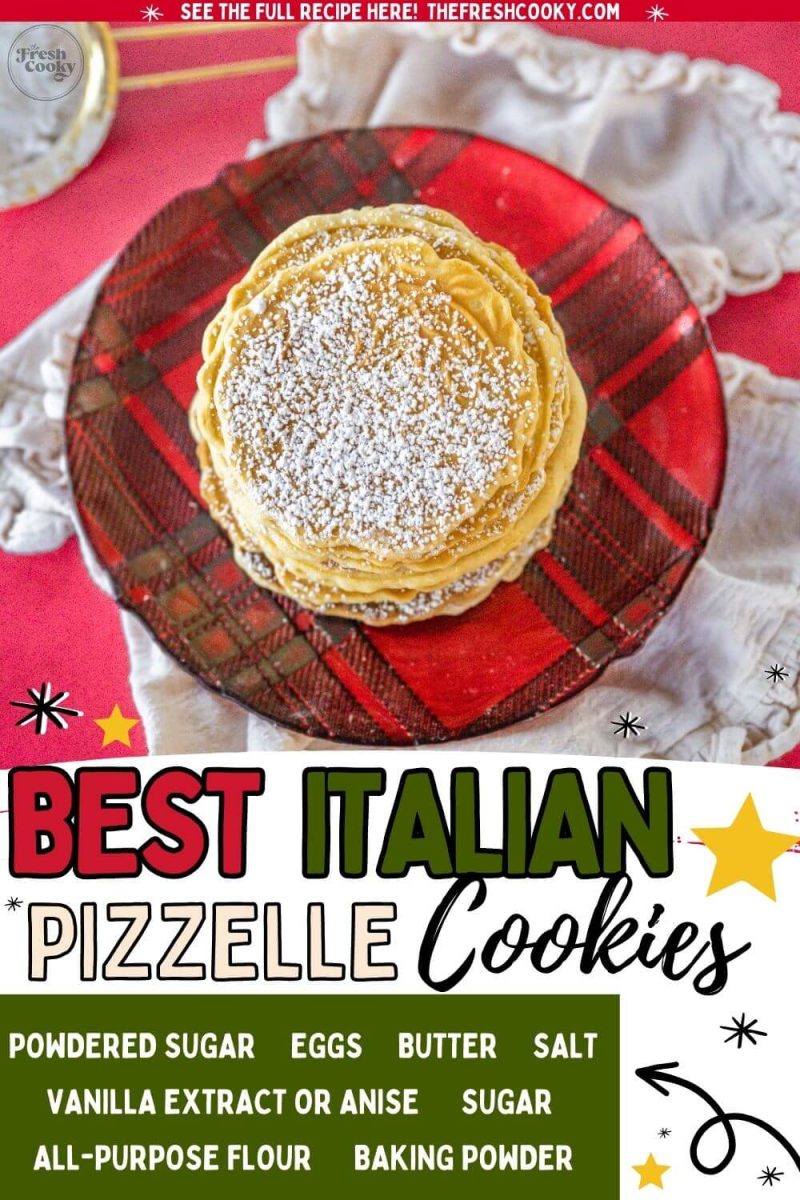 Dusted Pizzelles are in a pile on a red plaid plate near fine cloth, to pin.