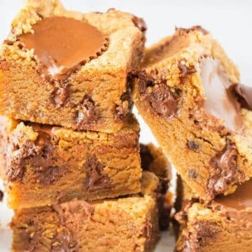 Stacked peanut butter blondies ooey and gooey.
