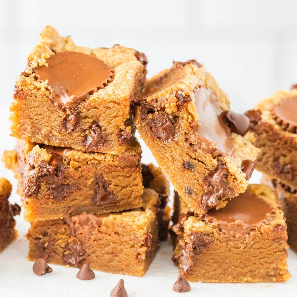 Stacked peanut butter blondies ooey and gooey.