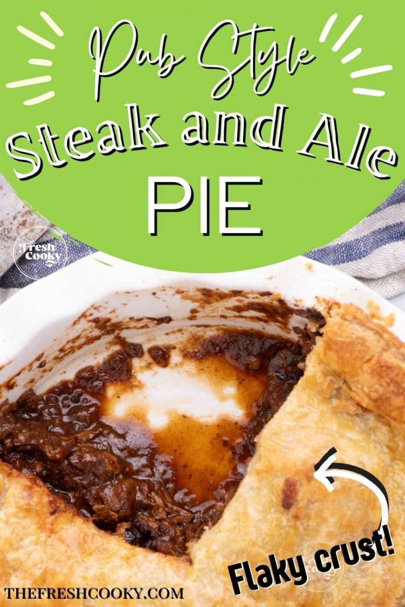 A piece of pie was removed from whole pie showing filling poking out, to pin.