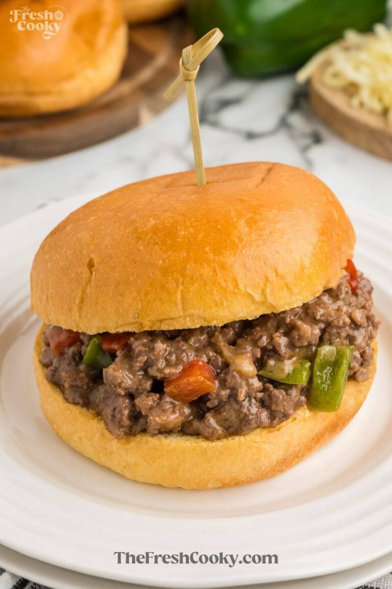 A brioche buns filled with Philly Cheesesteak Sloppy Joe filling, to pin.