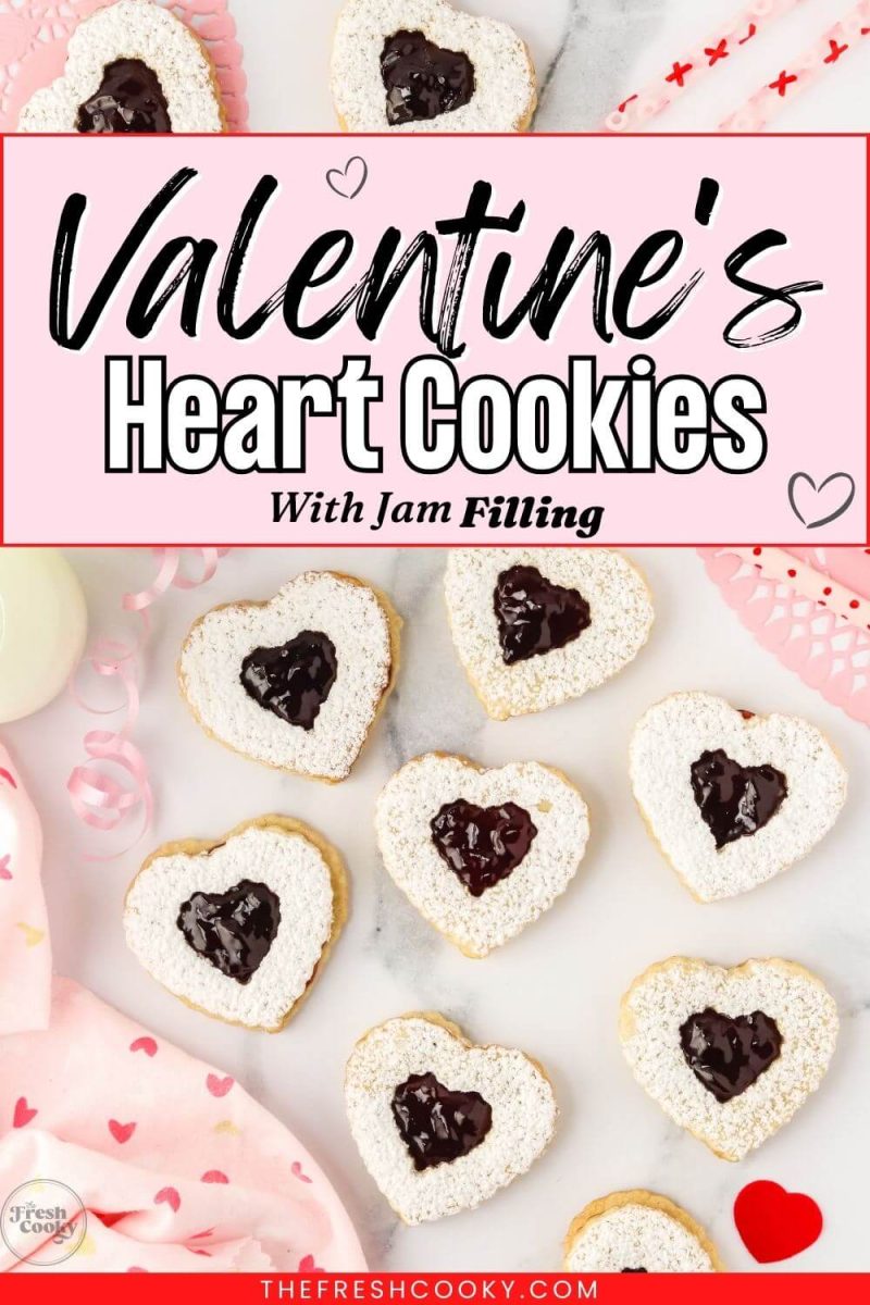 Heart shaped cookies lay on table with pink decorations, to pin.