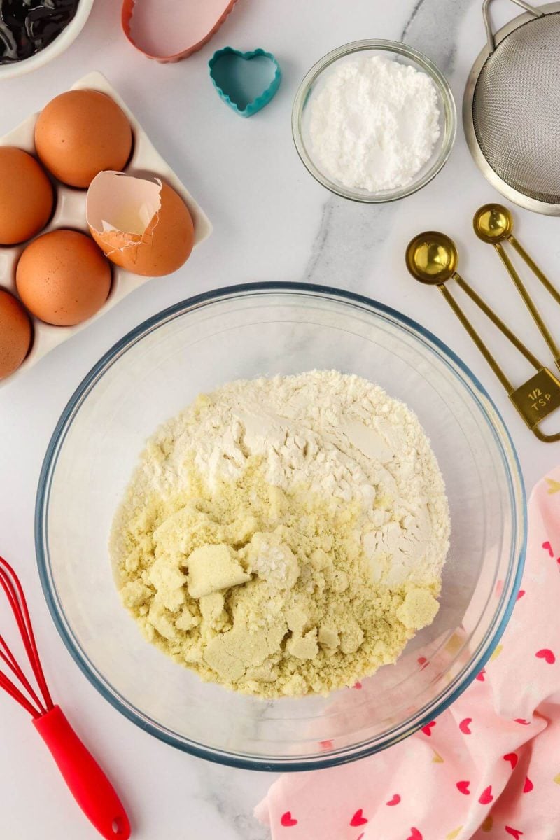 All-purpose flour, almond flour and salt sits in a mixing bowl.