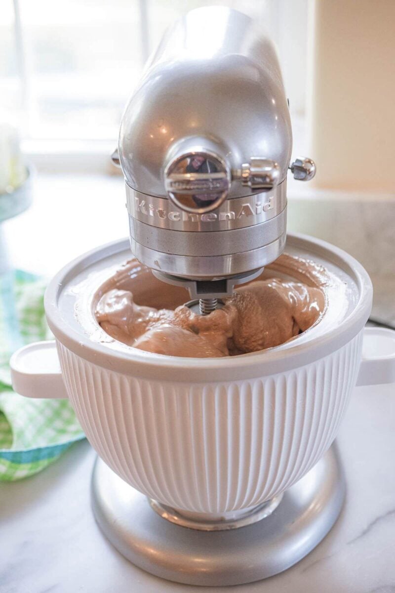 A KitchenAid ice cream machine spins thicker ice cream base.