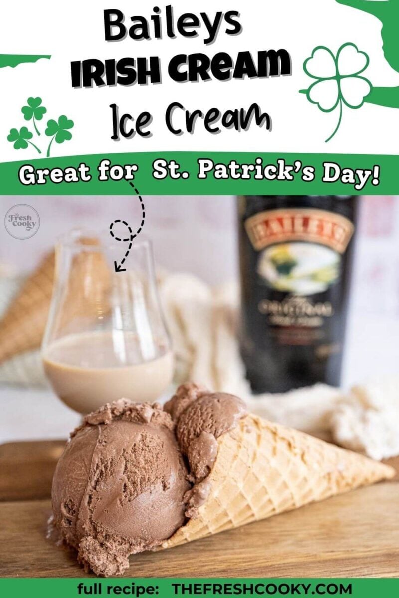 An ice cream cone lays on its side in front of glass and bottle of Baileys, to pin.