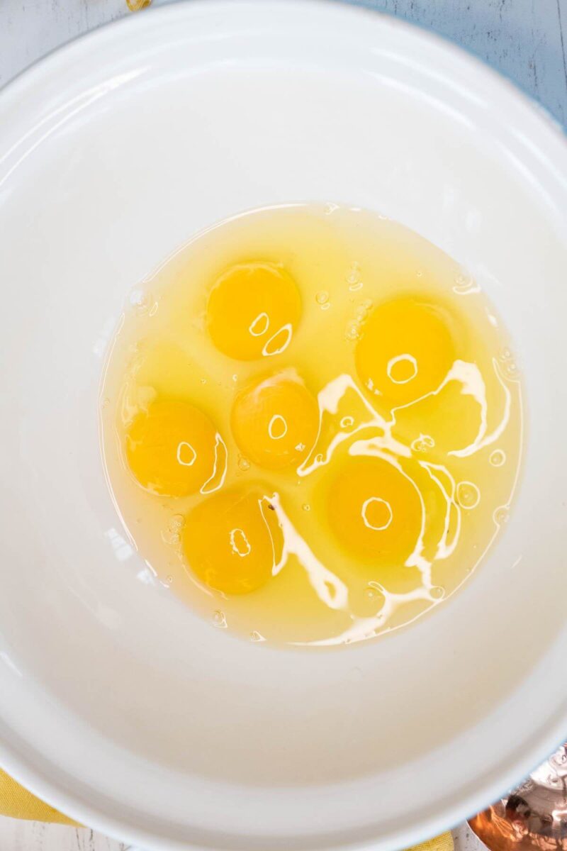 Add eggs to a large bowl. 