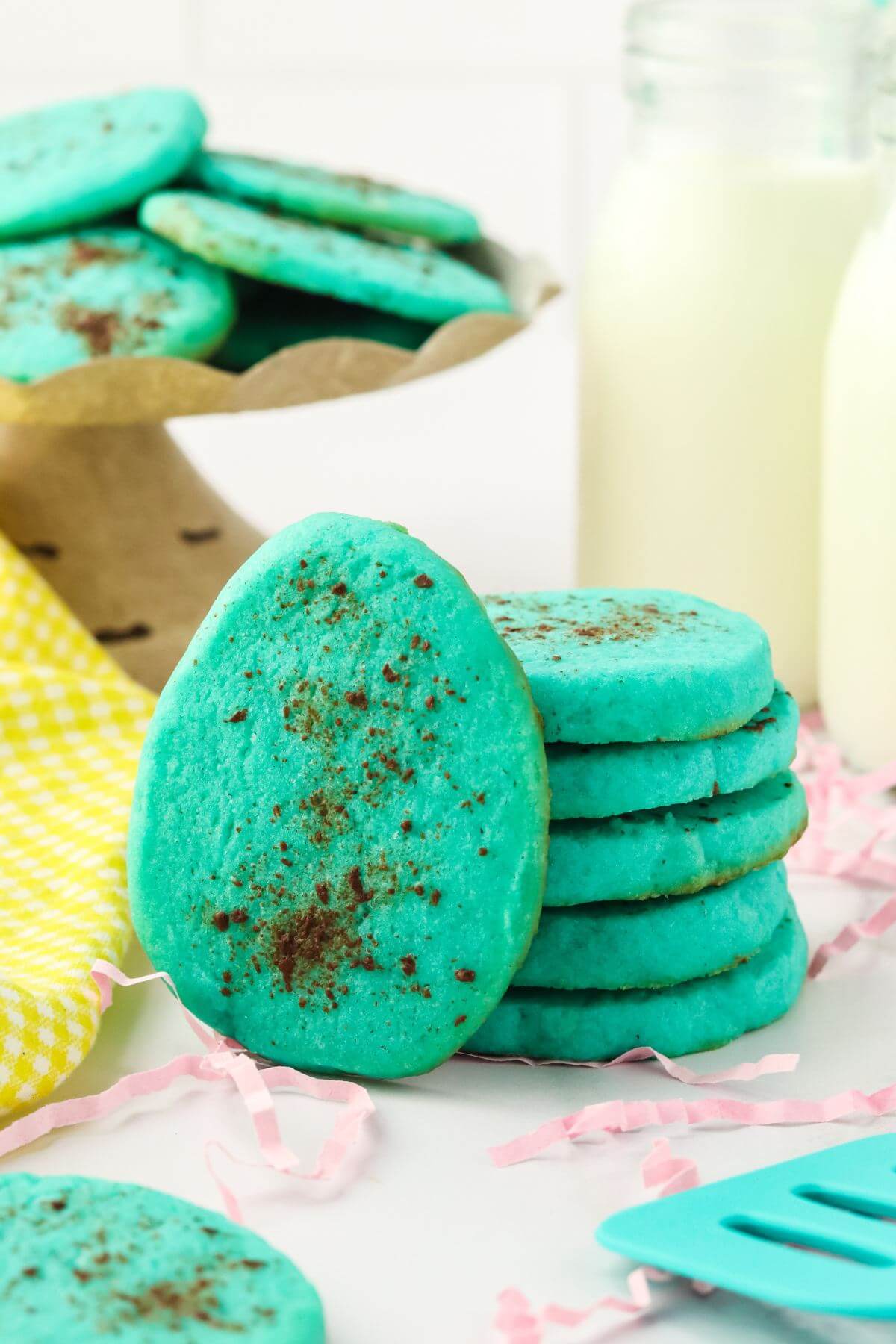 A stack of Robins Egg cookies with one leaning against the stack. 