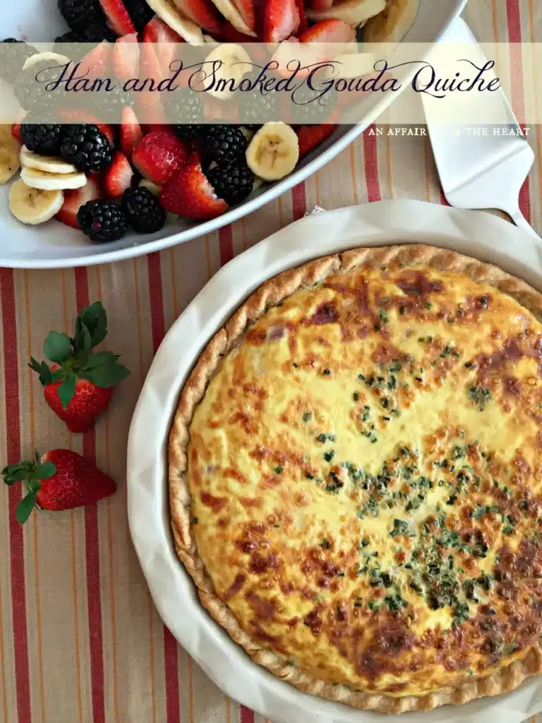 Ham and smoked gouda quiche with fruit salad.