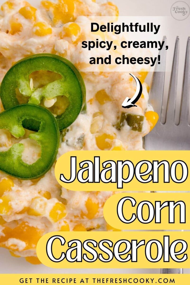 Two slices of jalapenos top a pile of white casserole dotted with yellow corn kernels, to pin.
