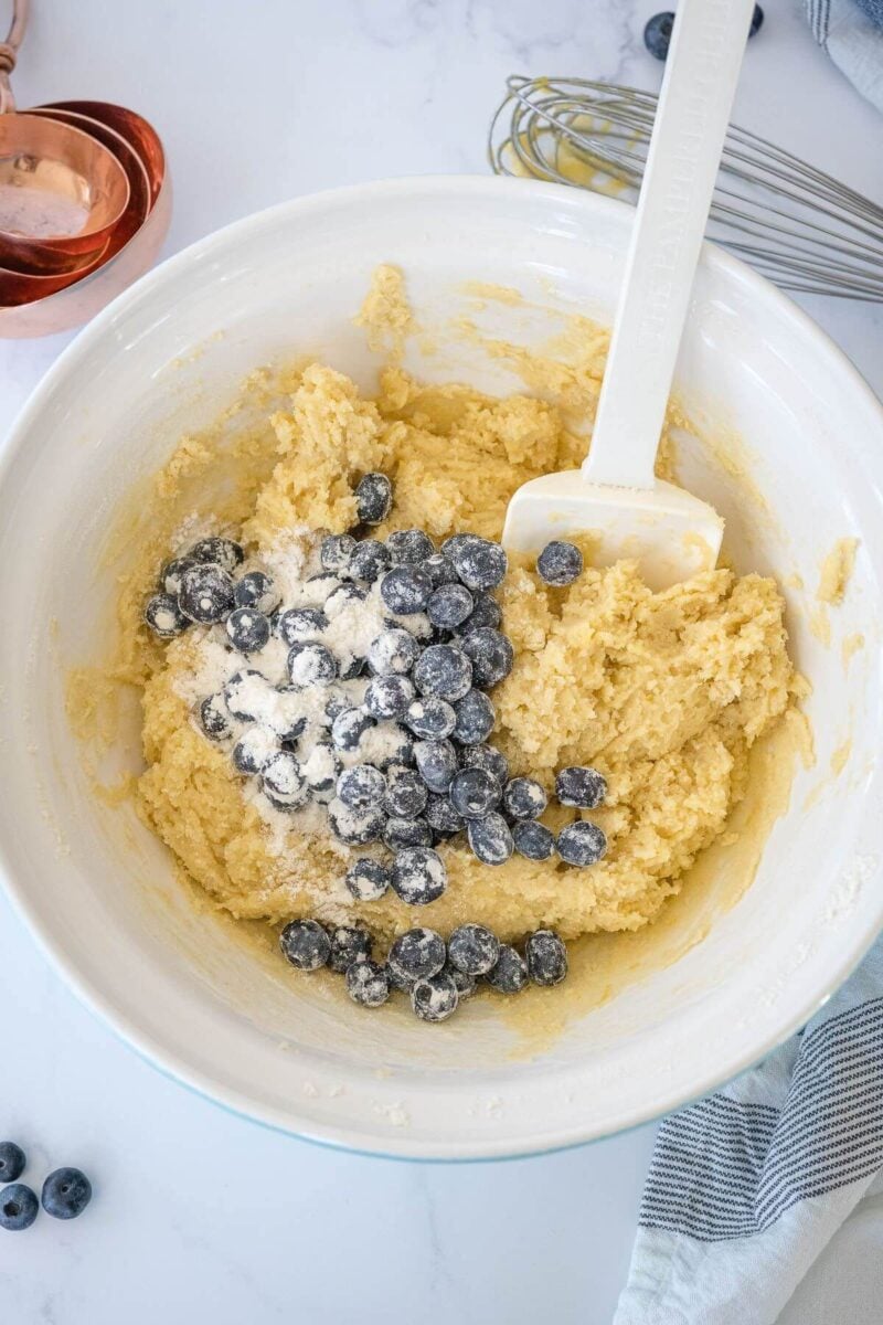 Carefully fold in the fresh blueberries into the batter. 