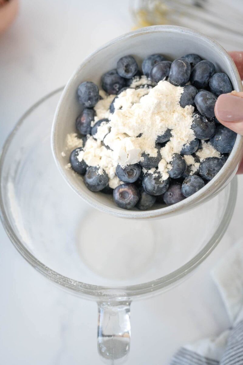 Toss fresh blueberries with 1 tablespoon of flour mixture. 