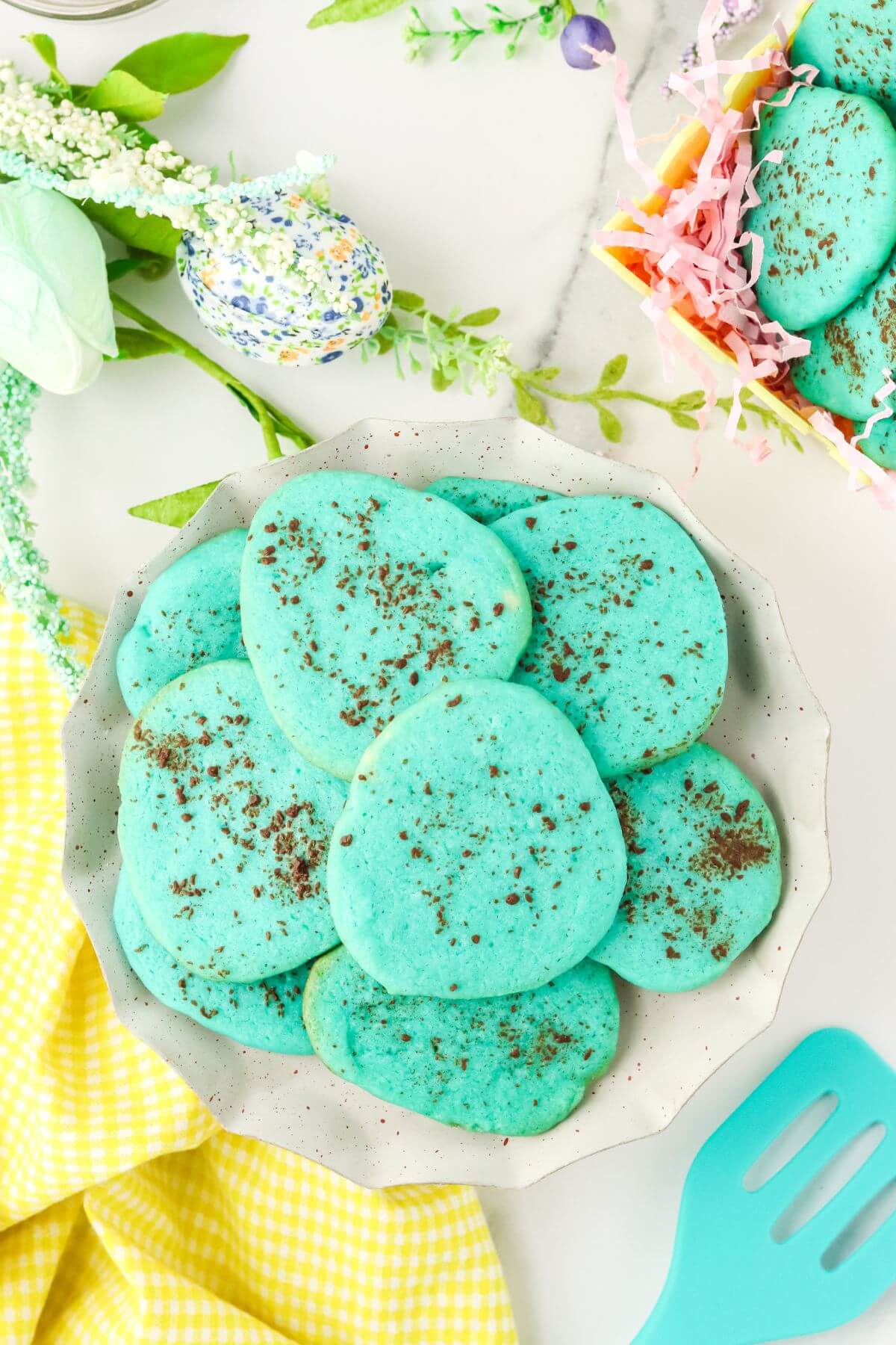 Robins Egg Easter Sugar Cookies stacked on a plate.