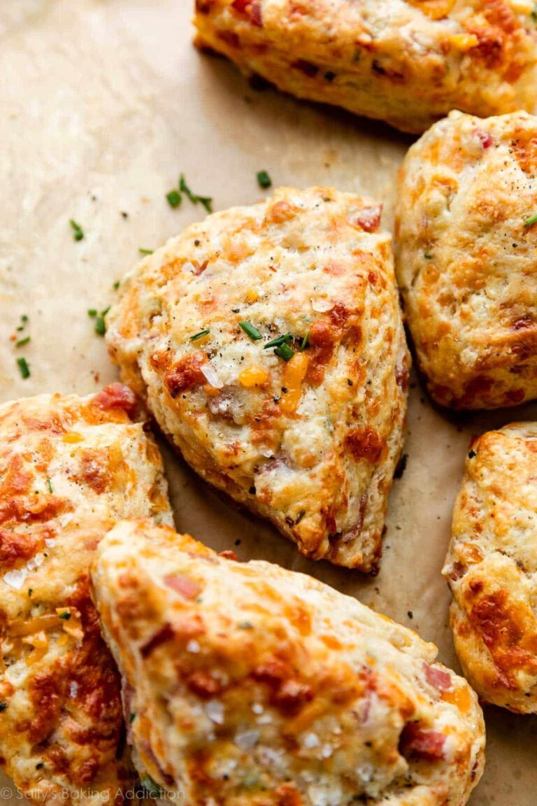 Savory ham and cheese scones on a tray.