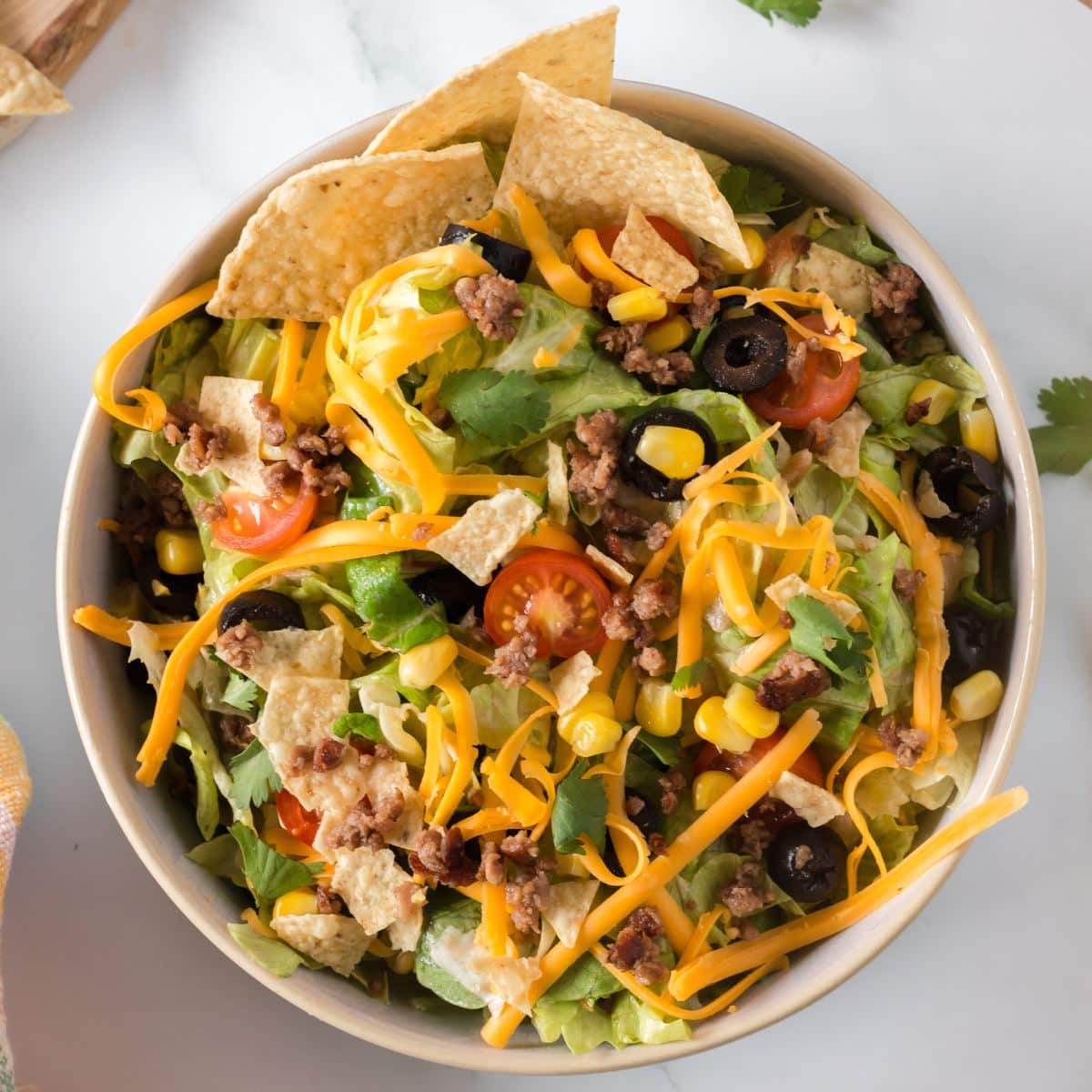 Tossed taco salad served in bowl. 