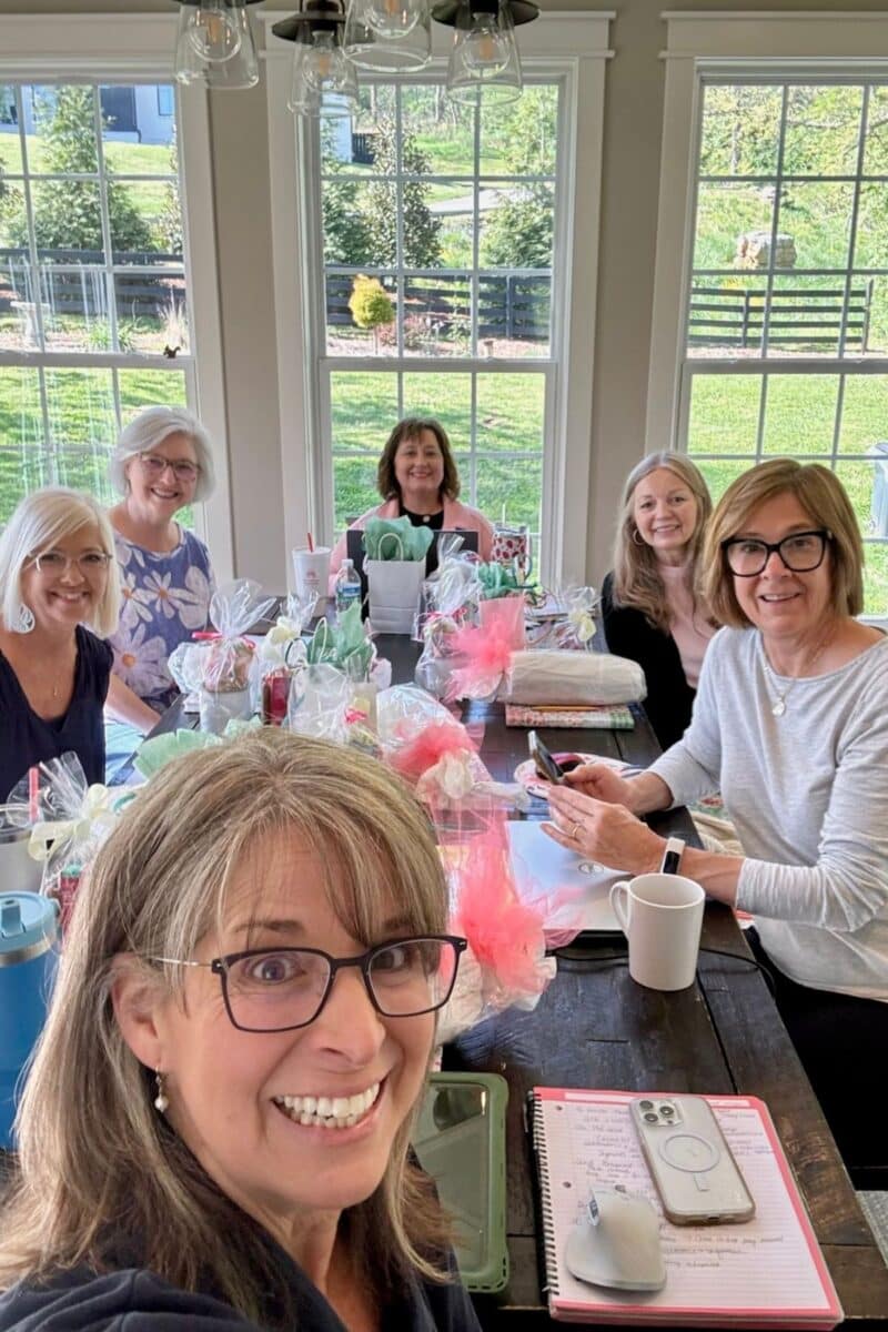 Mastermind group around the big farmhouse table.