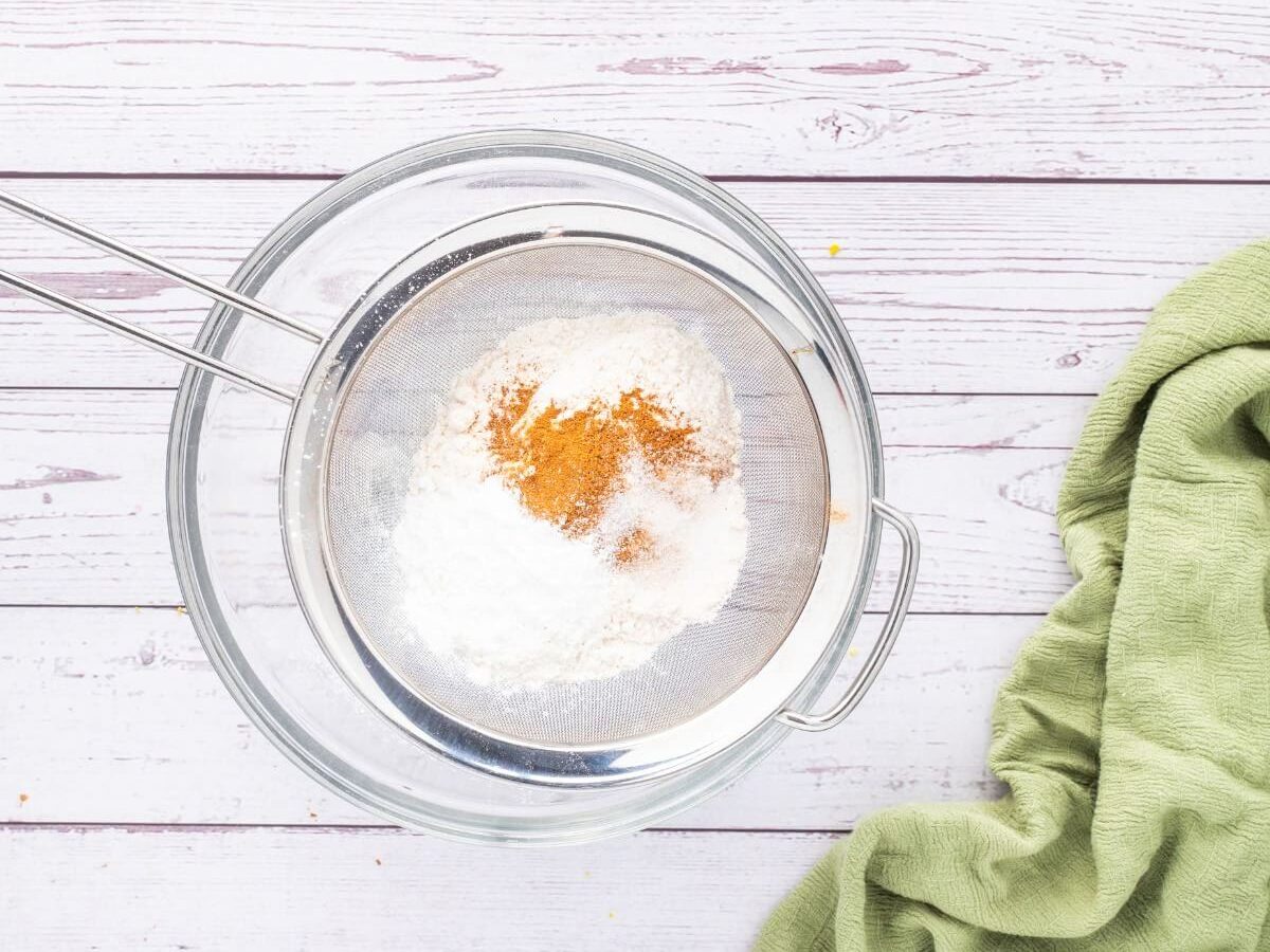 A sift with powdery ingredients lets them through into the bowl.