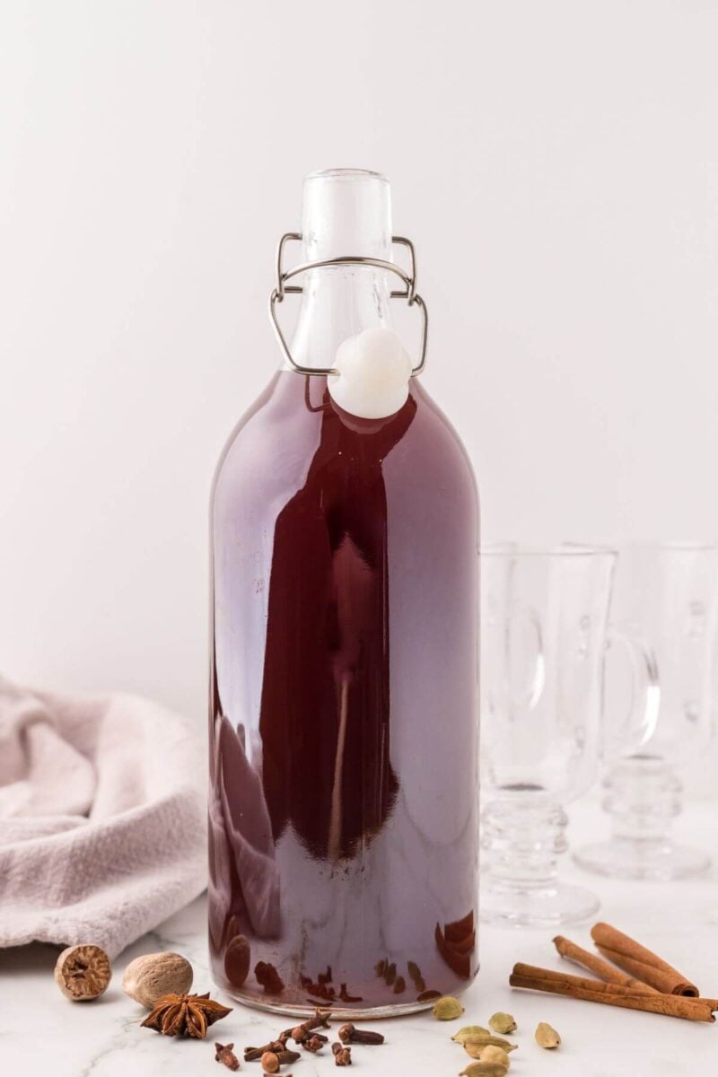 Chai concentrate in a large glass bottle with a swing top closure. 