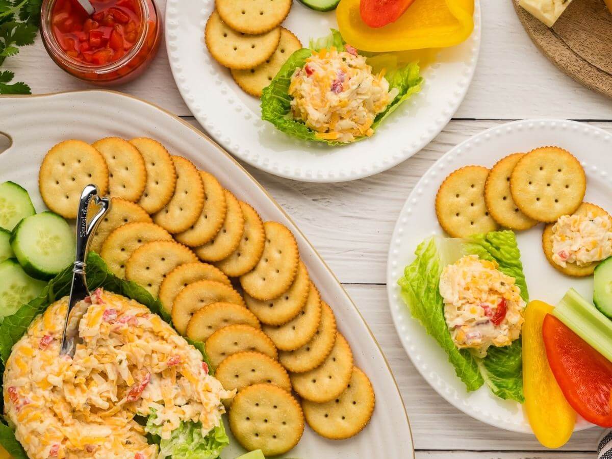 Pimento cheese spread on little pieces of lettuce and served with butter crackers and veggies. 