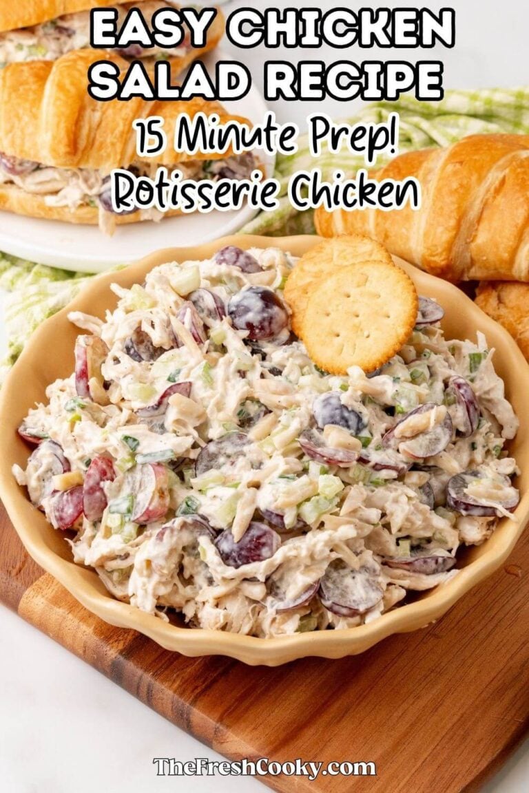 Chicken salad with grapes in a pretty scalloped bowl with crackers, croissants and lettuce, for pinning.