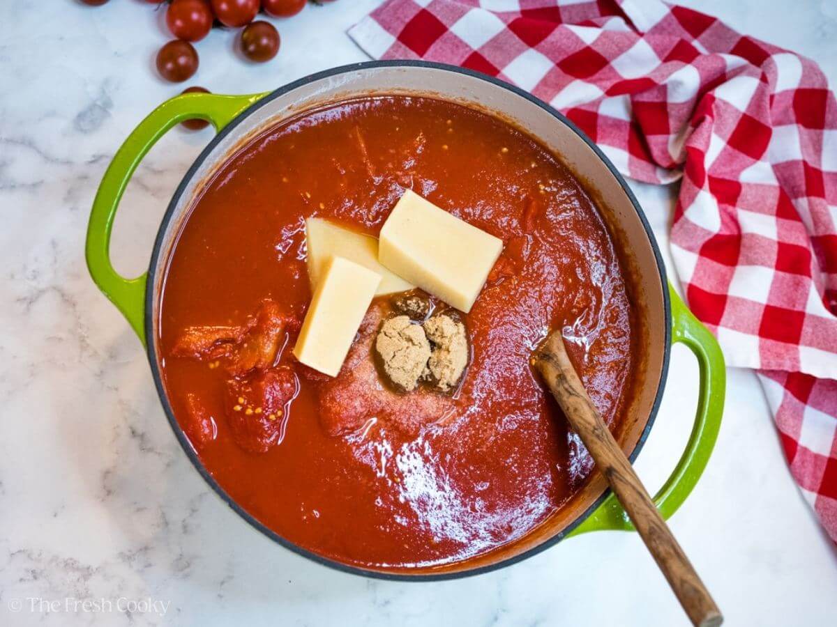 If adding, stir in parmesan rinds and brown sugar.
