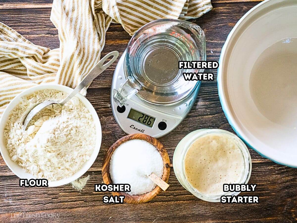 Ingredients needed to make homemade sourdough bread.