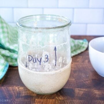 Day 3 sourdough starter in a glass jar.