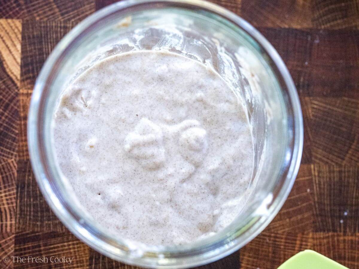 Sourdough starter before it is bubbly in a jar.