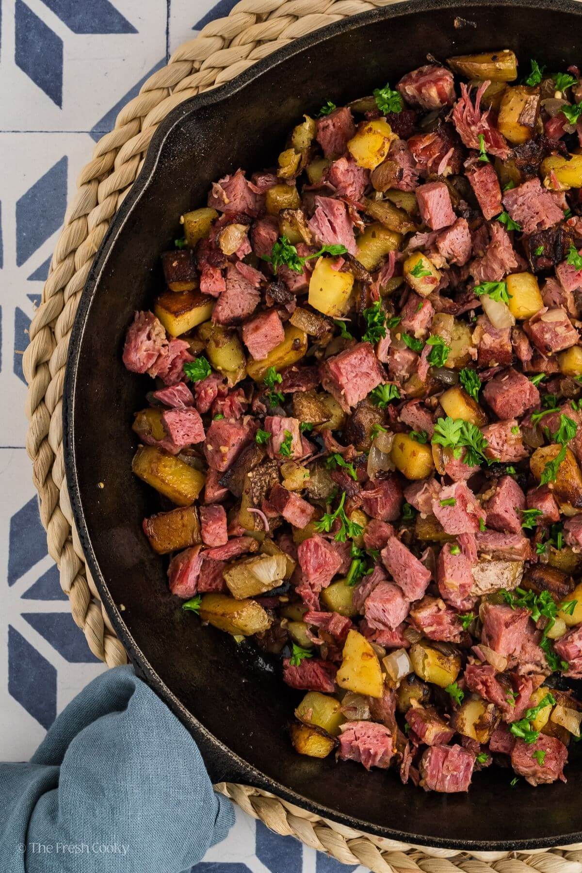 Corn beef hash in skillet. 
