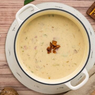 Overhead shot of finished pot of ham and potato soup.