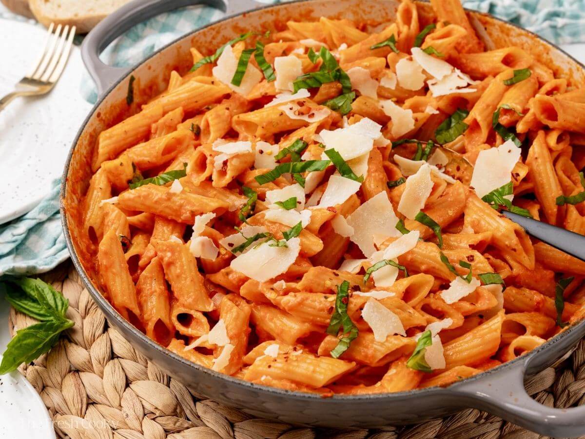 Close up of large skillet with pasta alla vodka. 