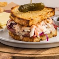 Grilled Corned Beef and Swiss sandwich with coleslaw and Thousand Island dressing.