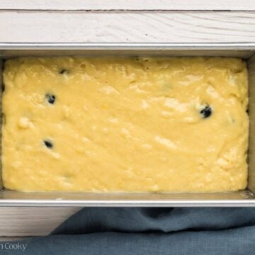 Lemon blueberry bread batter in loaf pan before baking.