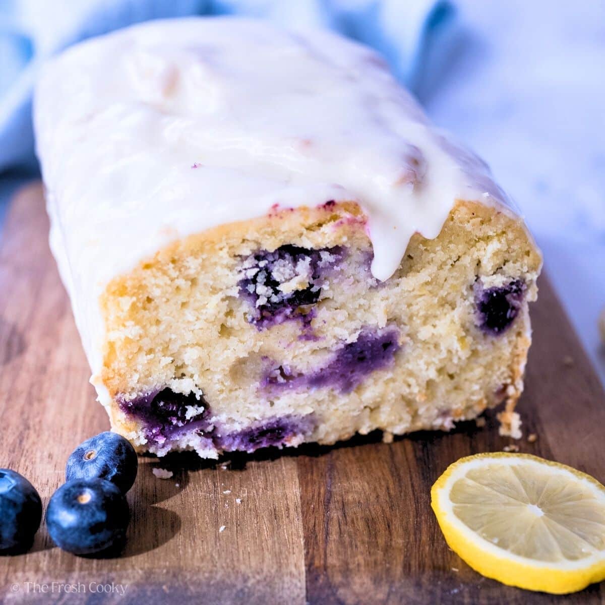 Lemon Blueberry loaf drizzled with lemon glaze. 