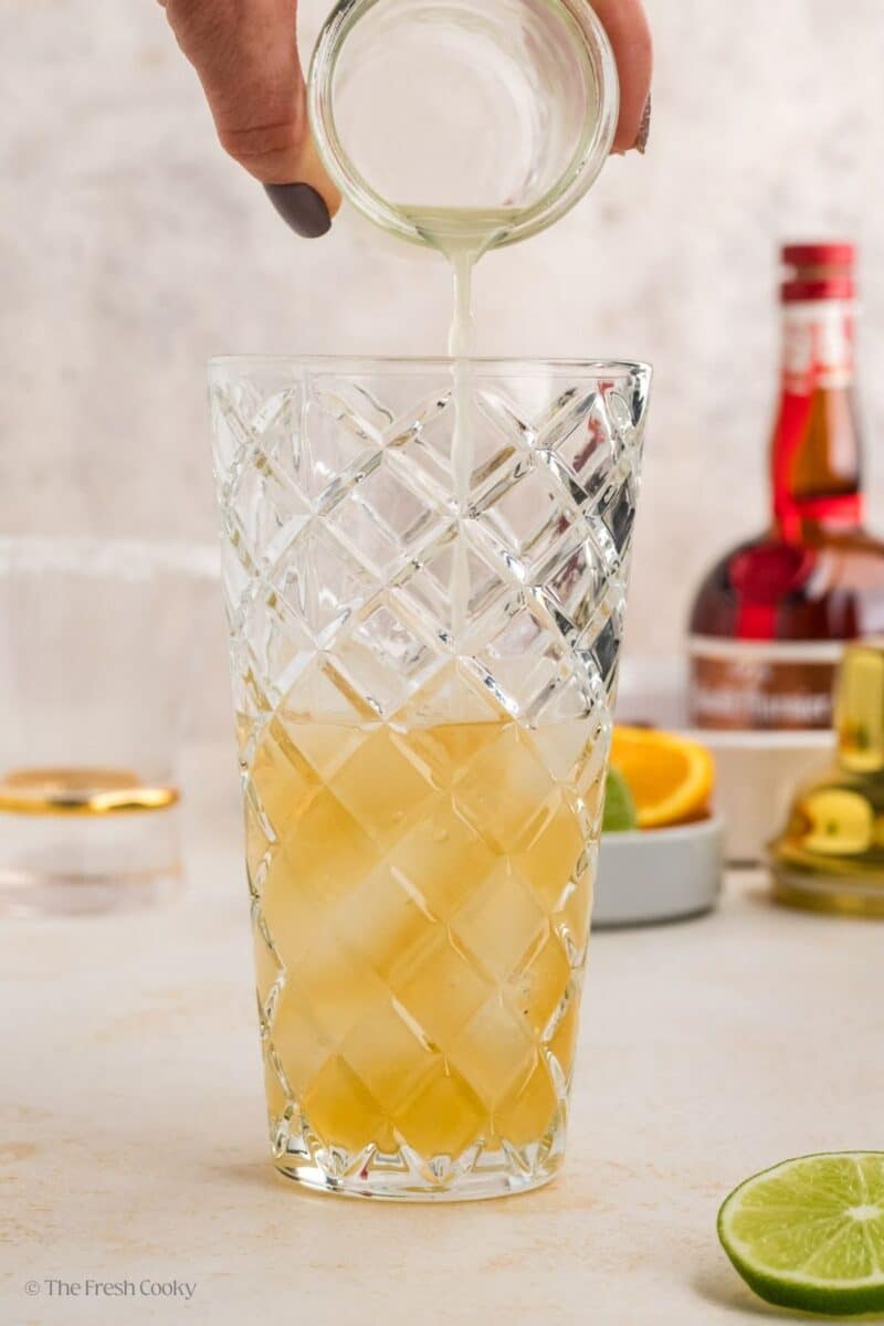 And finally add the lime juice and simple syrup.