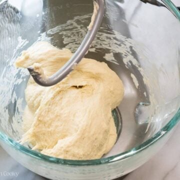 Bread dough kneaded in the stand mixer with a dough hook until the dough doesn't stick to the sides.