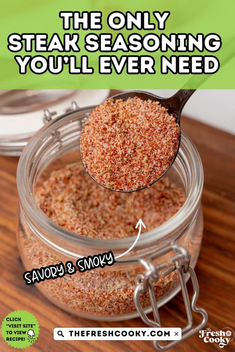 Spoonful of steak seasoning being taken out of a jar, to pin.