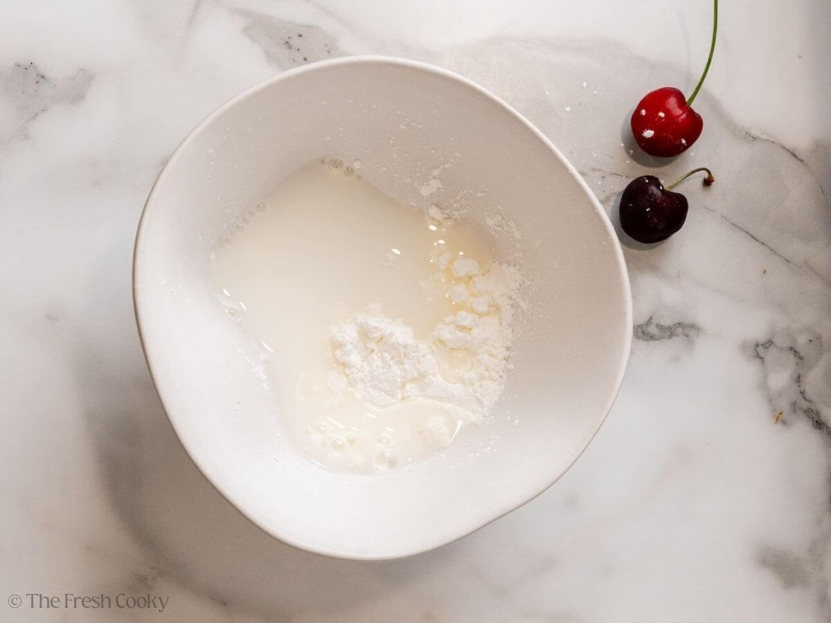 Cornstarch and water in a bowl.